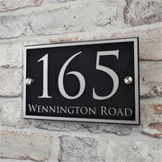 Black and silver house number sign from 'House Sign Solutions'