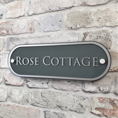 Slate Grey house name plaque thats says 